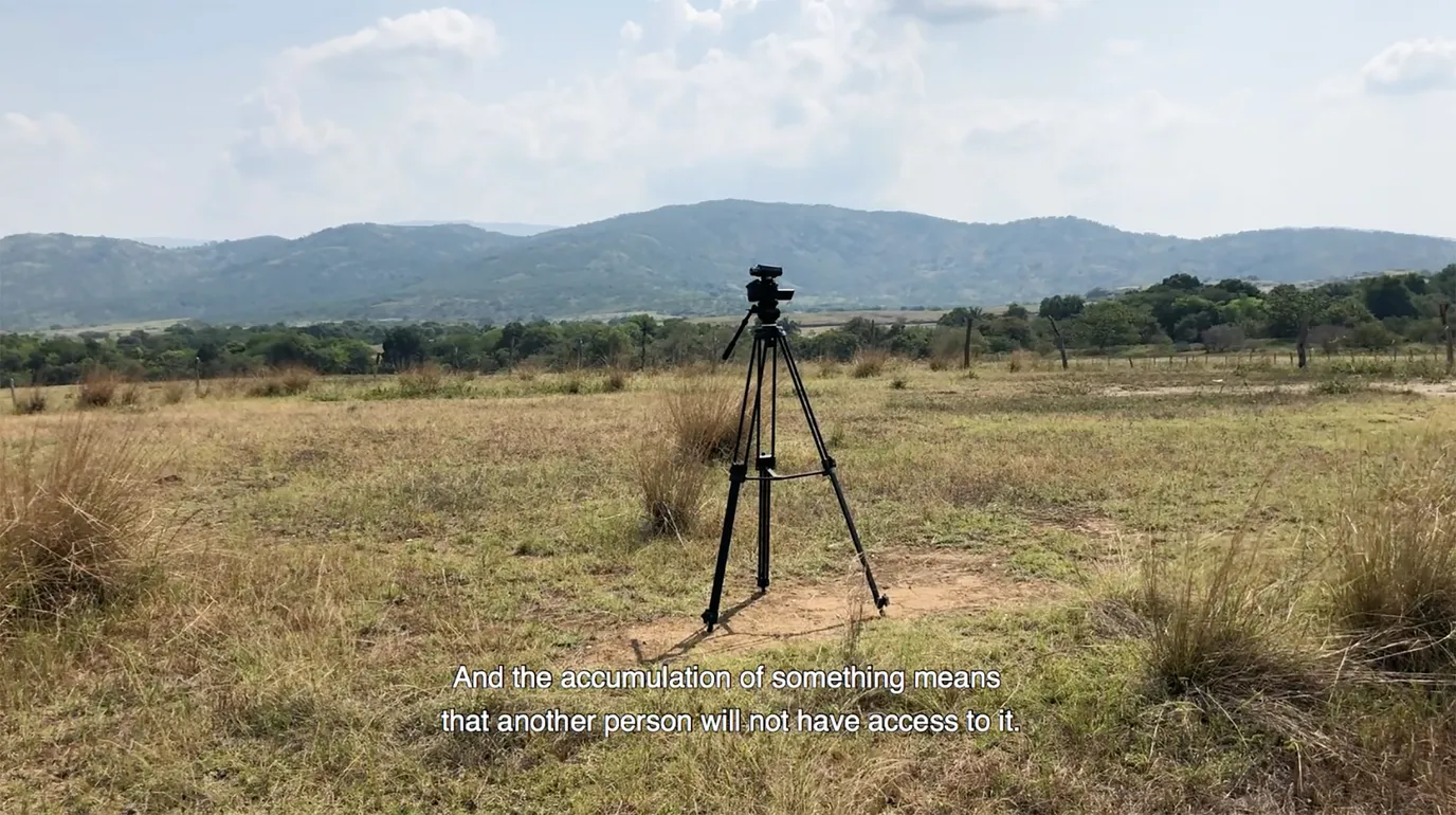 Still from the film Who Is Afraid of Ideology? by Marwa Arsanios: Tripod with camera in nature