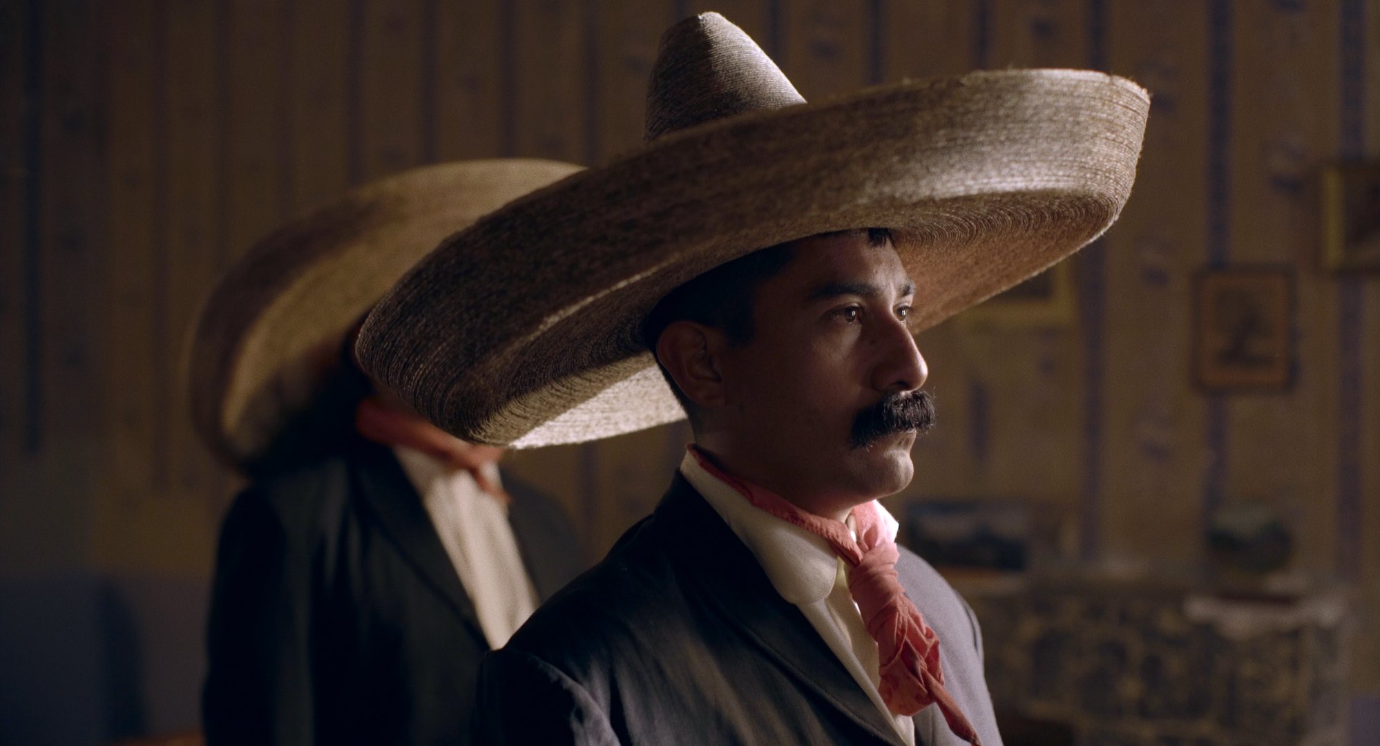 Still from the film Pornomelancholia by Manuel Abramovich: the main character of the film Lalo Santos in Emiliano Zapata's costume looking in front of him